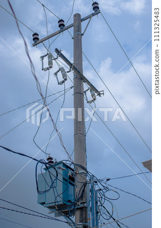 high power pole with many wires 111325483