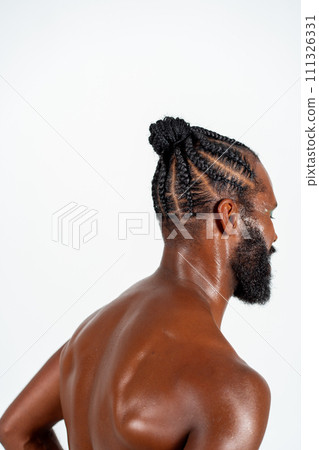 Shirtless black man with braided hairstyle in 111326331