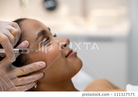 Woman having beauty injections in a beauty salon Woman having beauty injections in a beauty salon 111327575