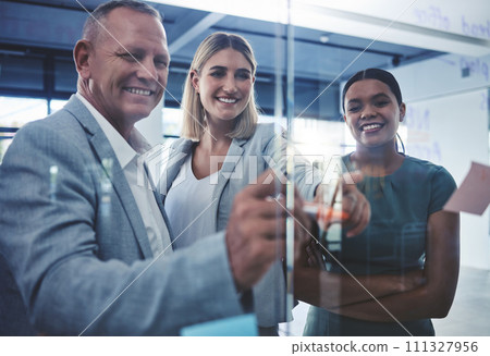 Business people planning with sticky note in meeting at work, happy with marketing partnership and writing strategy on post it paper in work office. Happy corporate employees in discussion about idea 111327956