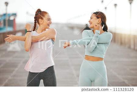 Fitness women, exercise and wellness with friends stretching and warming up during their workout and training outside. Happy accountability athlete partners out for a run for health and to stay fit Fitness women, exercise and wellness with friends stretching and warming up during their workout and training outside. Happy accountability athlete partners out for a run for health and to stay fit 111328120