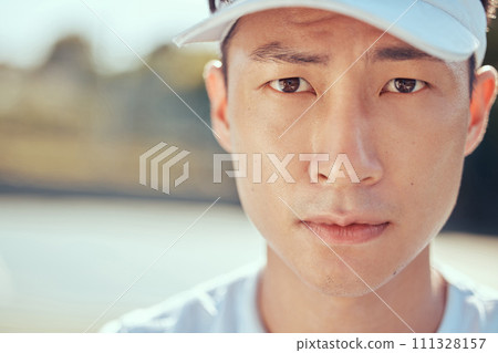 Sports, tennis and portrait of a sweating man with vision, goal and mission for game, competition or outdoor practice with sunshine. Young asian professional player with a serious or determined face Sports, tennis and portrait of a sweating man with vision, goal and mission for game, competition or outdoor practice with sunshine. Young asian professional player with a serious or determined face 111328157