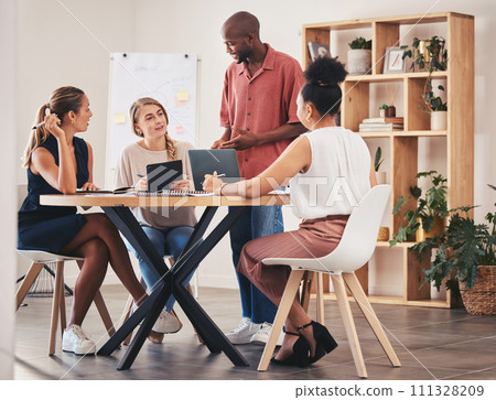 Teamwork, meeting and coaching of corporate people brainstorming and planning at a workshop. Diversity, training or strategy start up business workers in conversation or communication of ideas. Teamwork, meeting and coaching of corporate people brainstorming and planning at a workshop. Diversity, training or strategy start up business workers in conversation or communication of ideas. 111328209