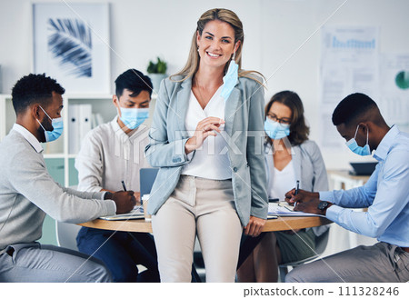 Meeting, office and covid in team collaboration of business people and leader woman in corporate planning. Portrait of a female manager happy to remove a coronavirus face mask at end of a pandemic. 111328246