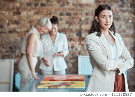 Leadership, manager and portrait of business woman in a meeting for a art exhibition in a creative office. Confident team leader or boss with arms crossed and a goal for vision and mission success Leadership, manager and portrait of business woman in a meeting for a art exhibition in a creative office. Confident team leader or boss with arms crossed and a goal for vision and mission success 111328527