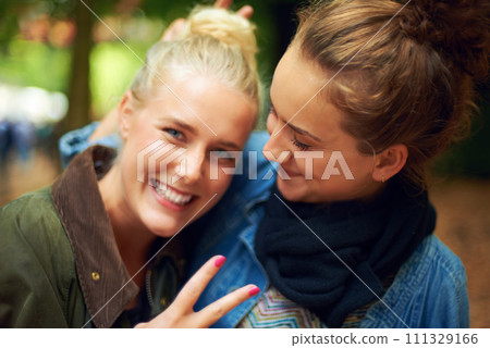 Park, peace sign and portrait of women hug on holiday, vacation and weekend in nature. Happy, smile and face of people with emoji for bonding, fun and relax on adventure, travel and outdoor trip Park, peace sign and portrait of women hug on holiday, vacation and weekend in nature. Happy, smile and face of people with emoji for bonding, fun and relax on adventure, travel and outdoor trip 111329166