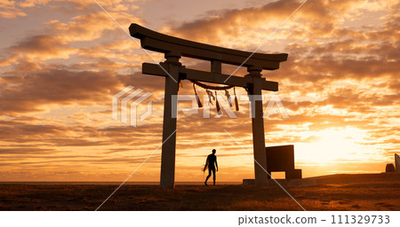 Torii gate, sunset sky and man at ocean with surfboard, spiritual history and travel adventure in Japan. Shinto architecture, Asian culture and calm beach in Japanese nature with sacred monument. 111329733