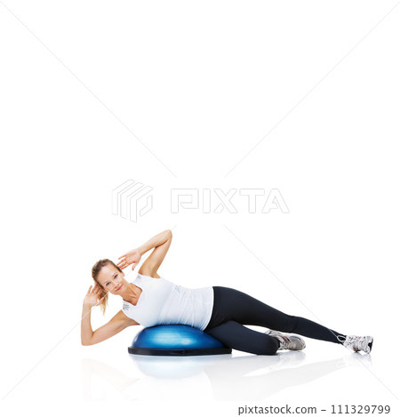 Portrait of woman, bosu ball or balance in studio or core workout isolated on white background. Female athlete, training equipment or fitness for mockup space, body challenge or exercise for wellness Portrait of woman, bosu ball or balance in studio or core workout isolated on white background. Female athlete, training equipment or fitness for mockup space, body challenge or exercise for wellness 111329799