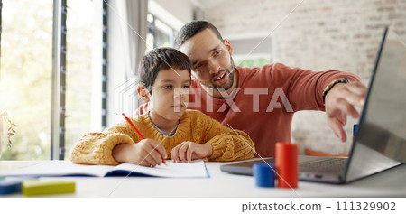 Father, boy child and homework with laptop, writing and helping hand for education, childhood development or care. Man, dad and male kid with home school, notebook and computer with teaching at desk 111329902