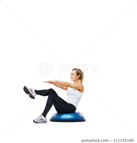 Woman, workout and sitting on half ball for exercise, fitness or training on a white studio background. Active female person on balance object for pilates, practice or strong core on mockup space 111330180