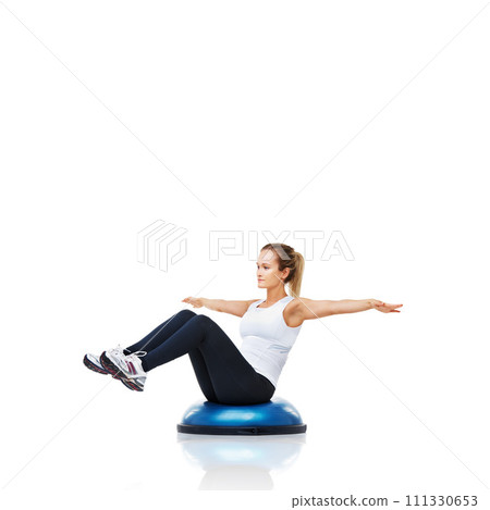 Balance, exercise and woman with bosu ball in workout, core training and wellness on white background. Muscle, strength and power with challenge on mockup space, athlete and fitness tools in studio Balance, exercise and woman with bosu ball in workout, core training and wellness on white background. Muscle, strength and power with challenge on mockup space, athlete and fitness tools in studio 111330653