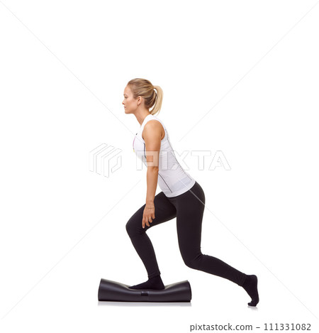 Woman, lunge and workout on mat, studio profile or stretching for fitness, health or balance by white background. Girl, yoga or pilates with training, thinking or muscle development for legs on floor Woman, lunge and workout on mat, studio profile or stretching for fitness, health or balance by white background. Girl, yoga or pilates with training, thinking or muscle development for legs on floor 111331082