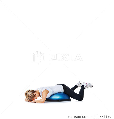 Woman, bosu ball and lying for workout, exercise or fitness on a white studio background. Young active female person or athlete on half round object for training, health and wellness on mockup space Woman, bosu ball and lying for workout, exercise or fitness on a white studio background. Young active female person or athlete on half round object for training, health and wellness on mockup space 111331159