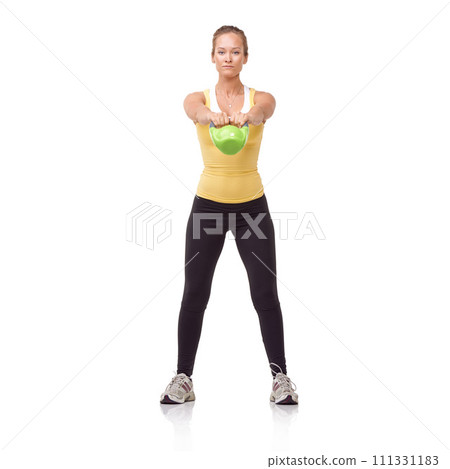 Exercise, portrait and studio woman with kettlebell swing for muscle growth, strong arm strength or weightlifting. Fitness equipment, gym commitment and bodybuilder determination on white background Exercise, portrait and studio woman with kettlebell swing for muscle growth, strong arm strength or weightlifting. Fitness equipment, gym commitment and bodybuilder determination on white background 111331183