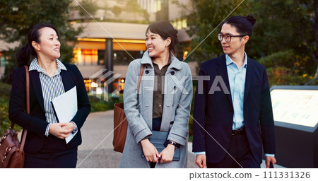 Walking, conversation and business people in the city talking for communication or bonding. Smile, discussion and professional Asian colleagues speaking and laughing together commuting in town. 111331326