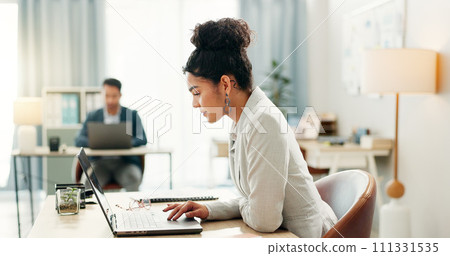 Woman with desk, laptop and typing in coworking space, market research and online schedule at consulting agency. Office, admin business and girl at computer writing email review, feedback or report. Woman with desk, laptop and typing in coworking space, market research and online schedule at consulting agency. Office, admin business and girl at computer writing email review, feedback or report. 111331535