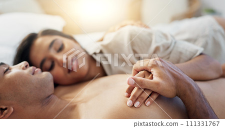 Happy couple, relax and hug on bed for morning, romance or love in embrace, trust or care at home. Young man and woman smile lying in bedroom rest for intimacy, passion or bonding together at house 111331767