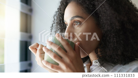 Relax, window and woman with coffee, thinking and stress relief with happiness, home and wellness. Female person, lady and warm beverage with ideas, calm and curious with peace, view and apartment 111331833