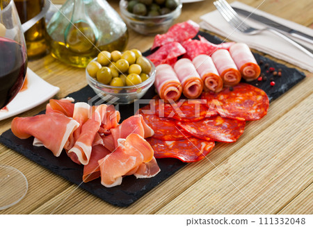 Meat platter on slate board Meat platter on slate board 111332048