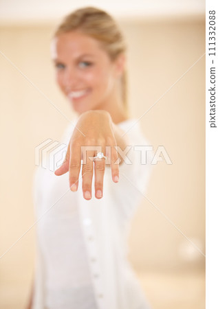 Woman, hands and wedding ring with engagement announcement and diamond sparkle. Marriage, female person and love with jewelry band, proposal and fiance with a smile and happy from commitment Woman, hands and wedding ring with engagement announcement and diamond sparkle. Marriage, female person and love with jewelry band, proposal and fiance with a smile and happy from commitment 111332088