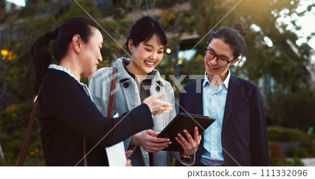 Tablet, discussion and business people in the city talking for communication or bonding. Smile, conversation and professional Asian colleagues speaking with digital technology in urban town. 111332096