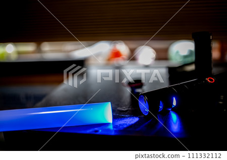 Assorted parts to build a laser sword from a kit with a hilt, neon blade, sound board and control chip. Assorted parts to build a laser sword from a kit with a hilt, neon blade, sound board and control chip. 111332112