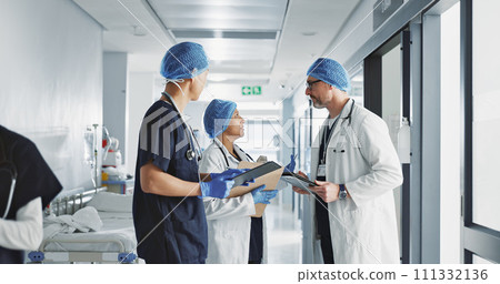 Healthcare, talking and doctors with a tablet at a hospital for health advice or surgery communication. Help, clinic and medical employees speaking with technology, planning and schedule for nursing 111332136