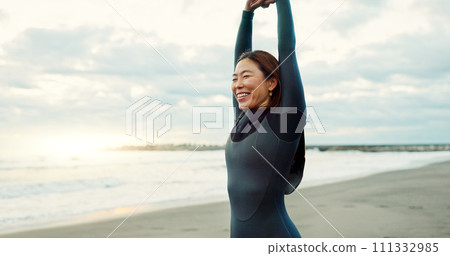 Surfer, beach and woman with stretching, smile and vacation with getaway trip, workout and training. Person, Japan and adventure with ocean, waves and exercise with warm up, muscle and wellness 111332985