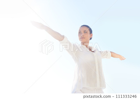 Sky, sunshine and woman doing yoga for exercise, stress relief and outdoor wellness for morning fitness. Balance, summer flare and female yogi doing pilates performance, workout or training routine 111333246