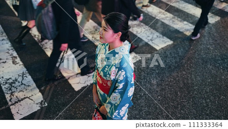 Woman, Japanese traditional clothes and walk in city, view and travel with journey outdoor. Fashion, adventure and urban street in Kyoto, kimono or dress for culture and style with local trip 111333364