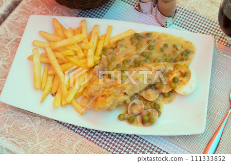 Monkfish tail with clams and shrimps. 111333852