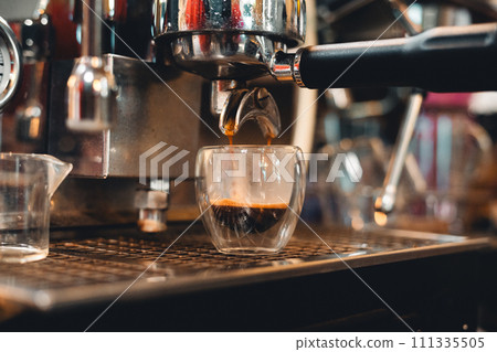 Preparing coffee with coffee maker 111335505