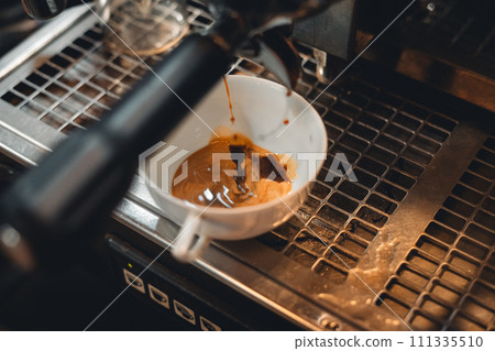 Preparing coffee with coffee maker Preparing coffee with coffee maker 111335510
