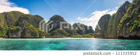 Tropical islands view with ocean blue sea water and white sand beach at Maya Bay of Phi Phi Islands, Krabi Thailand nature landscape panorama 111335952