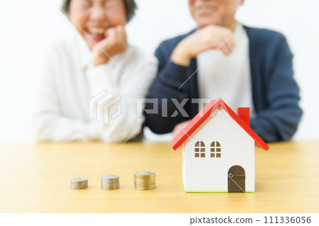 Thinking senior couple real estate Thinking senior couple real estate 111336056