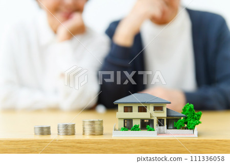 Thinking senior couple real estate Thinking senior couple real estate 111336058