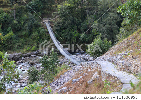 long suspension bridge in nepal, gandaki village 111336955