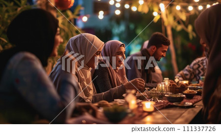 Arabian family eating iftar in Ramadan. Break fasting during Ramadan. 111337726