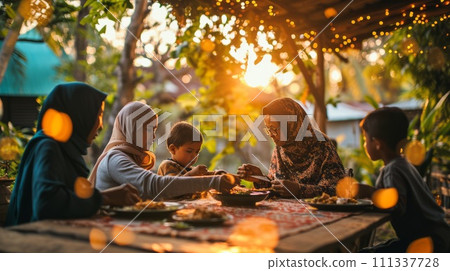 Arabian family eating iftar in Ramadan. Break fasting during Ramadan. 111337728