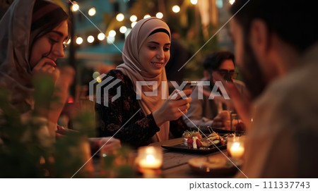 Arabian family eating iftar in Ramadan. Break fasting during Ramadan. 111337743