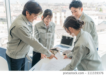 Engineers, workers, designers, and architects wearing work clothes for construction, architecture, government, and town planning. Engineers, workers, designers, and architects wearing work clothes for construction, architecture, government, and town planning. 111339376