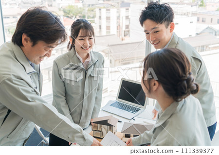 Engineers, workers, designers, and architects wearing work clothes for construction, architecture, government, and town planning. Engineers, workers, designers, and architects wearing work clothes for construction, architecture, government, and town planning. 111339377