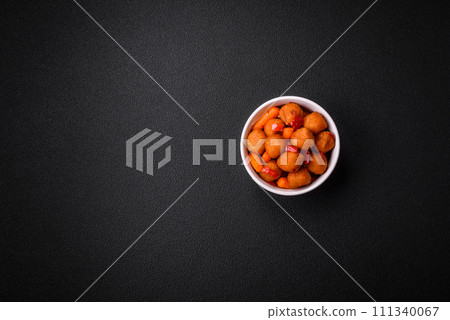 Delicious fried potato balls with vegetables, salt, spices and herbs Delicious fried potato balls with vegetables, salt, spices and herbs 111340067