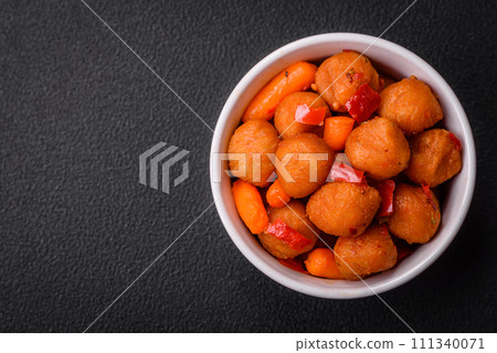 Delicious fried potato balls with vegetables, salt, spices and herbs 111340071