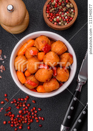 Delicious fried potato balls with vegetables, salt, spices and herbs Delicious fried potato balls with vegetables, salt, spices and herbs 111340077