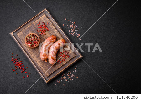 Delicious grilled chicken or pork sausages with salt and spices Delicious grilled chicken or pork sausages with salt and spices 111340200