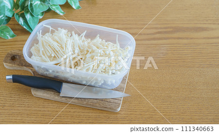 Finely cut enoki mushrooms 111340663