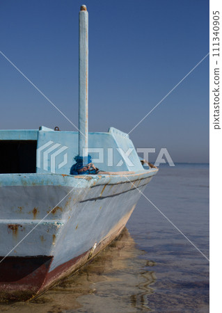 Abandoned boat after a wreck 111340905