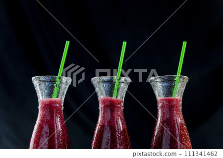 Smoothies with Beetroot, blueberries and mint in glass jar with fruits and vegetables on the wooden table. Detox, diet, healthy, vegetarian drink concept 111341462