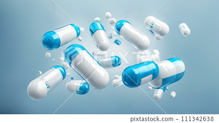 Falling blue and white medicine pill capsules on blue background. Antibiotics 111342638